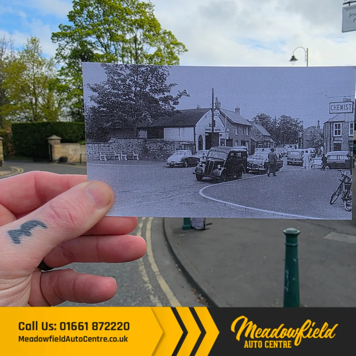 Then and now: an old photograph of the Ponteland Motor Co. and a street lined with cars, held up against the same spot in Ponteland today